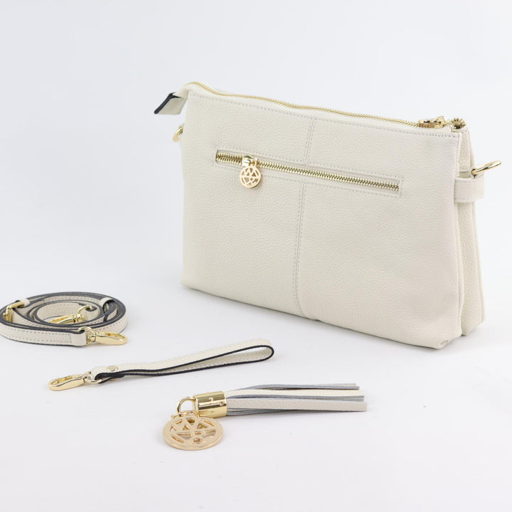 ruby leather handbag in ivory winter white coloured pebbled leather back view#colour_ivory